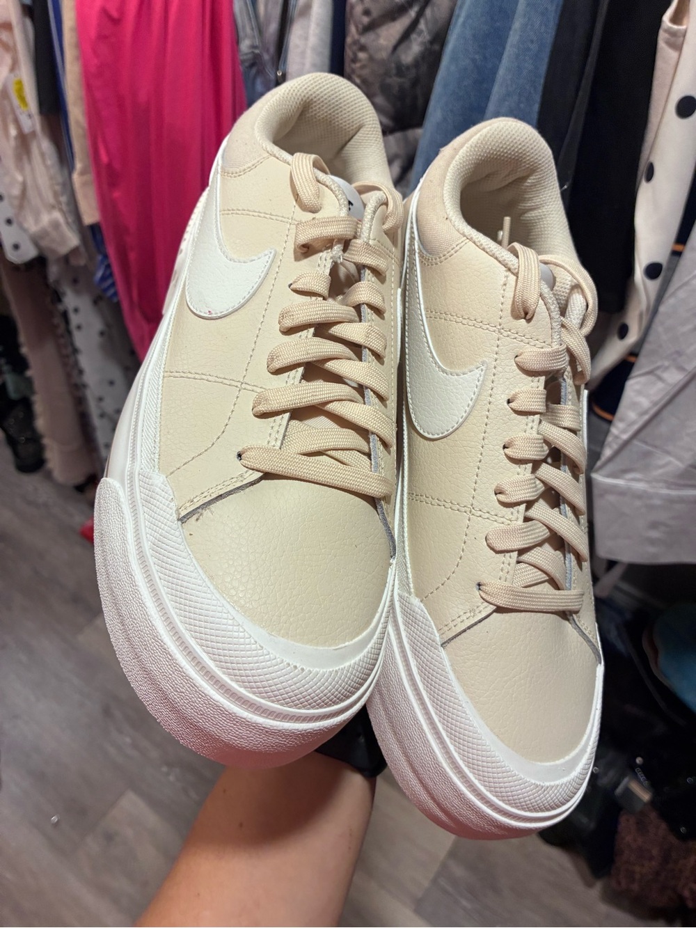 Nike Beige Low-Top Sneakers with White Swoosh